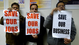 Members of the Asian community protesting at Community Board #3 during a meeting focusing on 37th Road.  Photos Javier Castaño